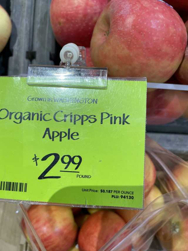 Grown iVG NGION Organic Cripps Pink Apple 299 POUND Unit Price $0.187 PER OUNCE PLU 94130