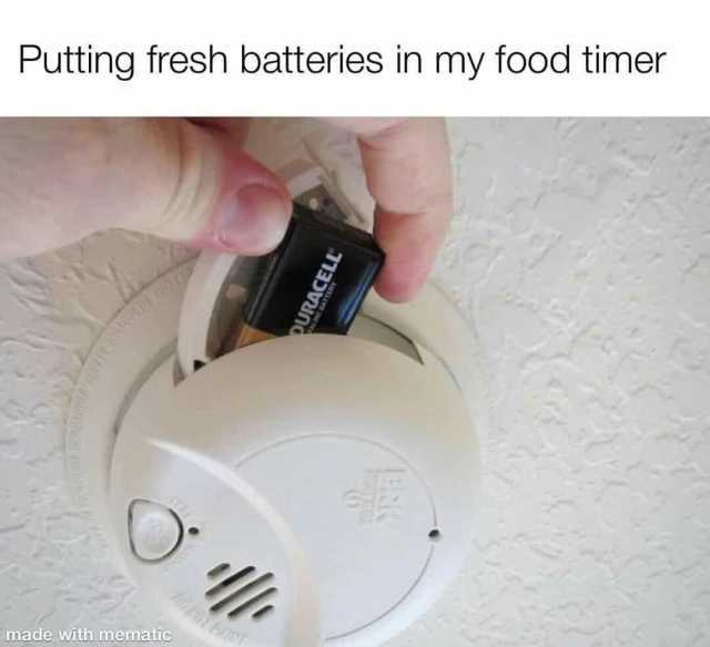 Putting fresh batteries in my food timer O made with mematic