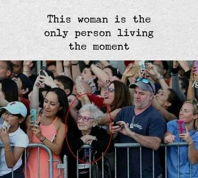 This woman is the only person living the moment